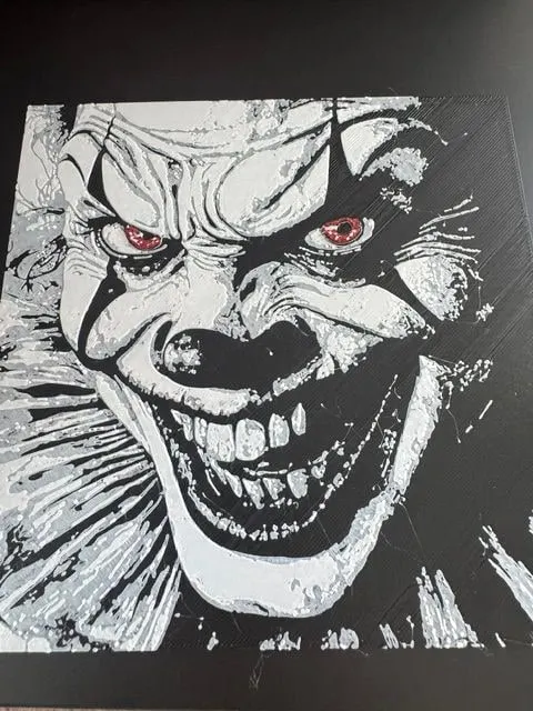 Grayscale HueForge of a horror-film clown with red eyes