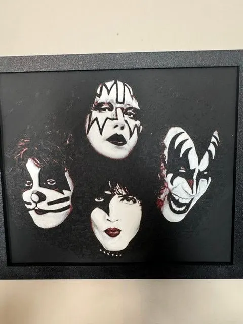 Framed HueForge of four painted rock-band faces