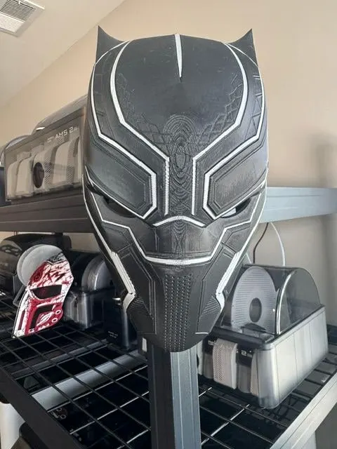 Black and gray panther superhero helmet, front view