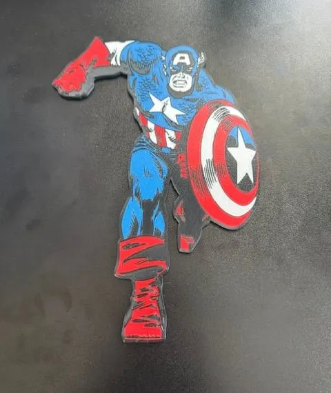 Flat multicolor relief of a comic-book hero with a round shield
