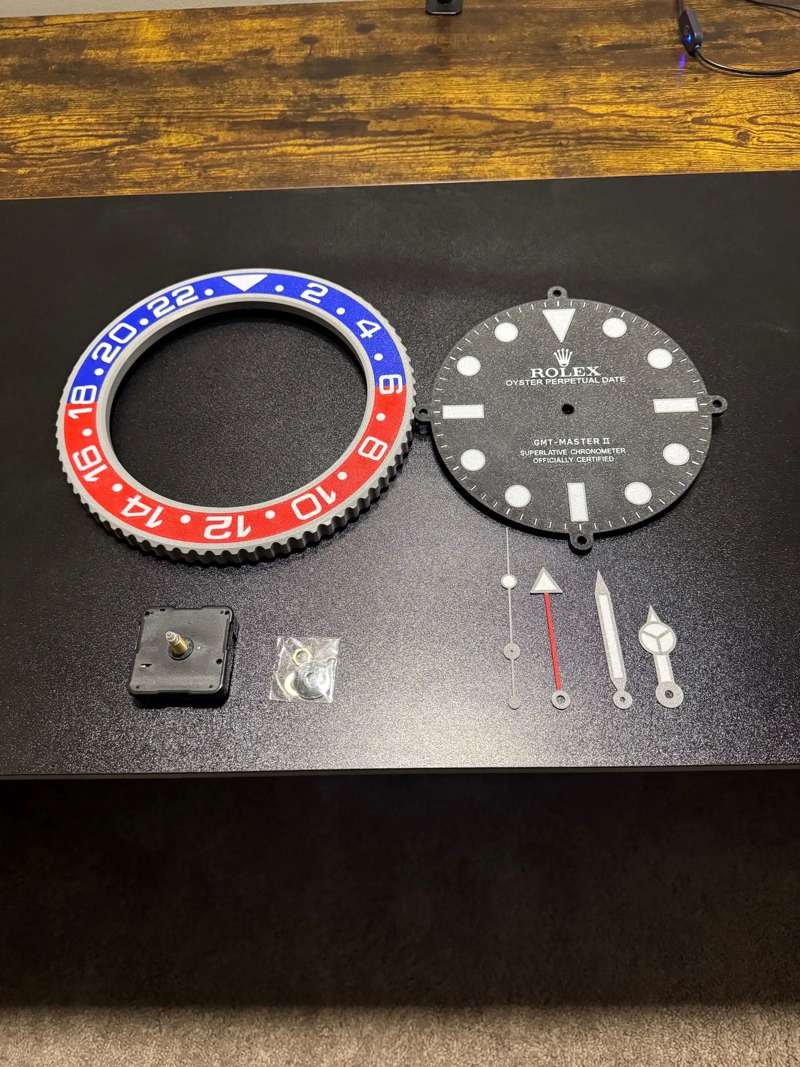 Printed parts for a wall clock styled after a two-tone dive-watch bezel